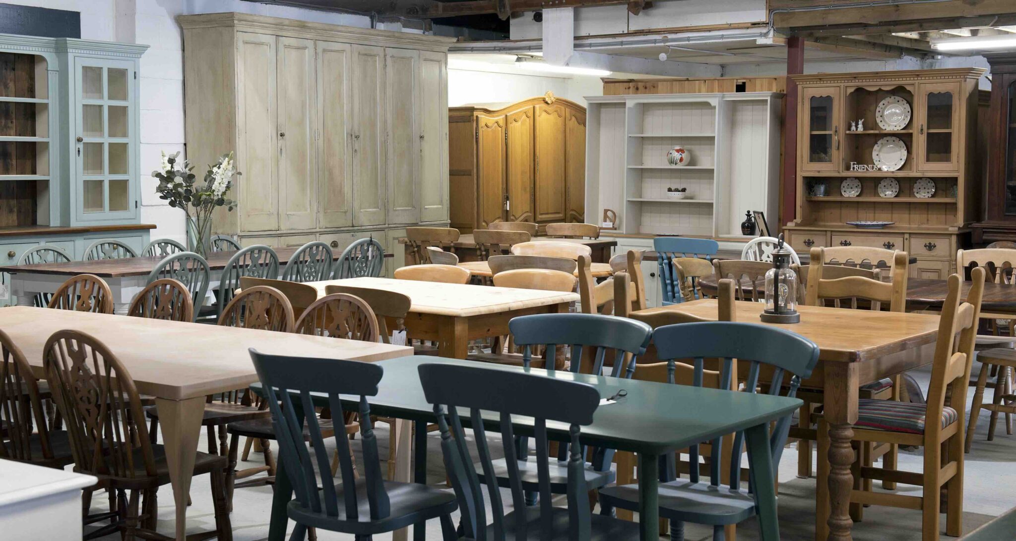 Sustainable refurbished furniture shop in York showing painted wooden furniture and up-cycled furniture